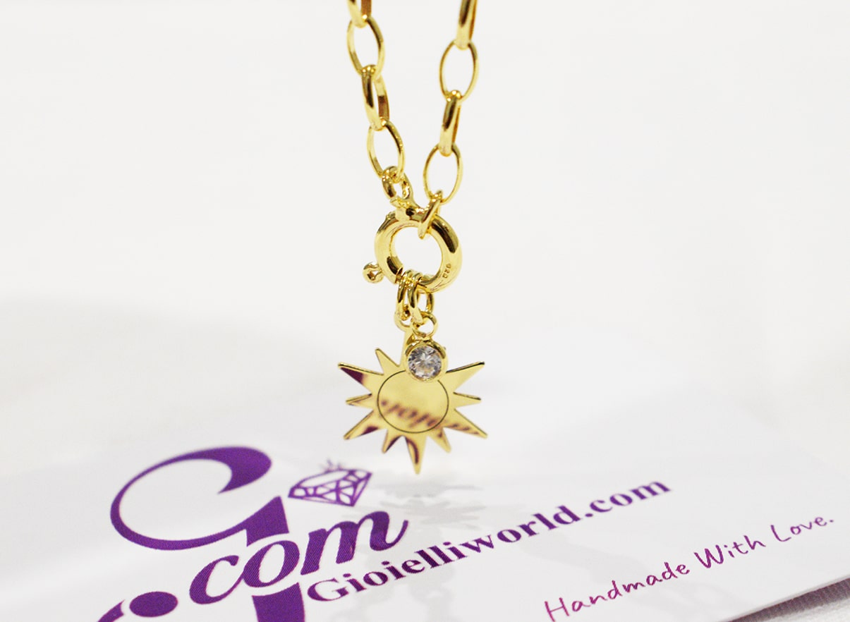 Collana Sole con punto luce di zircone in argento 825 placcata oro.