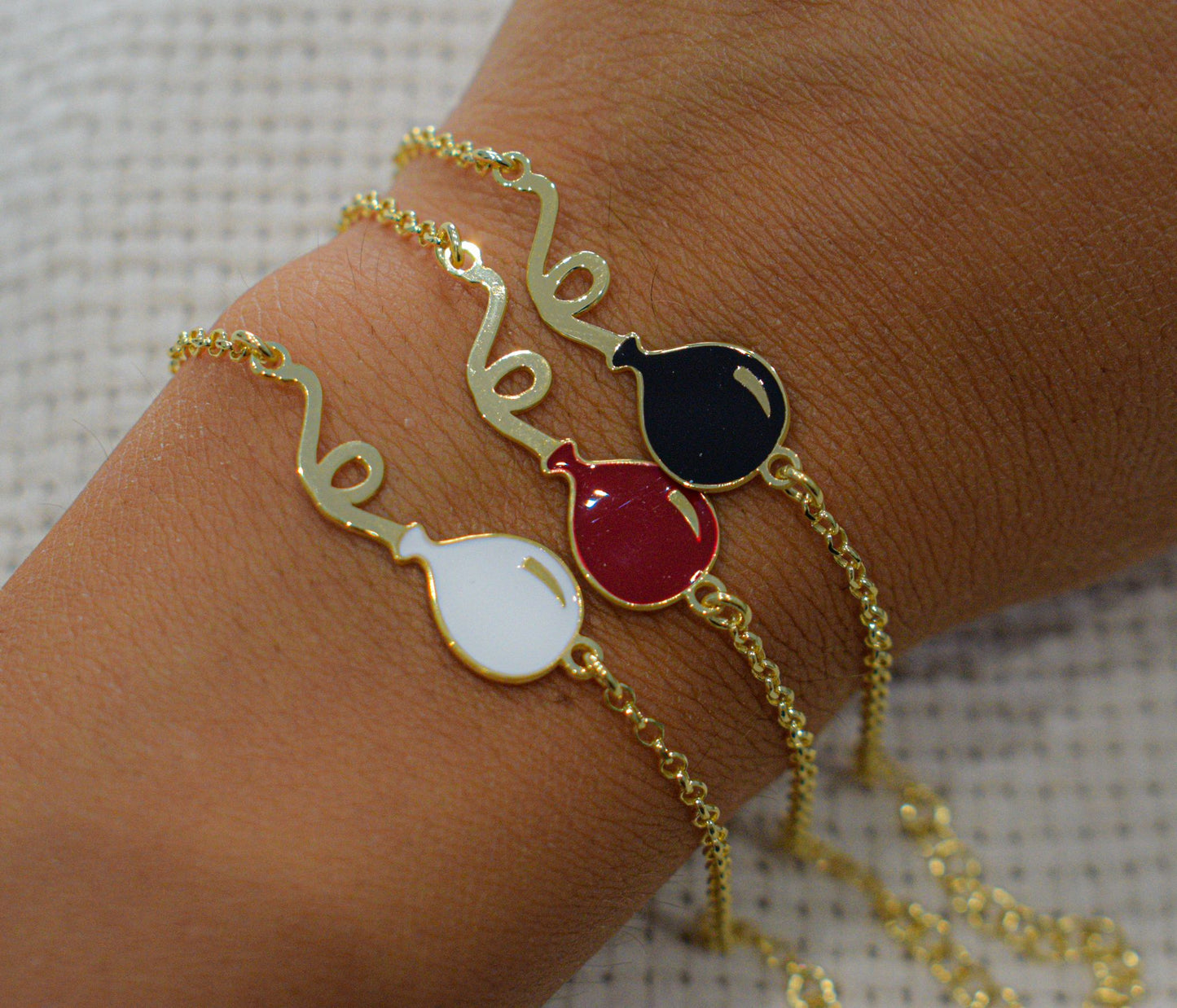 Bracciali con palloncini placcati in oro