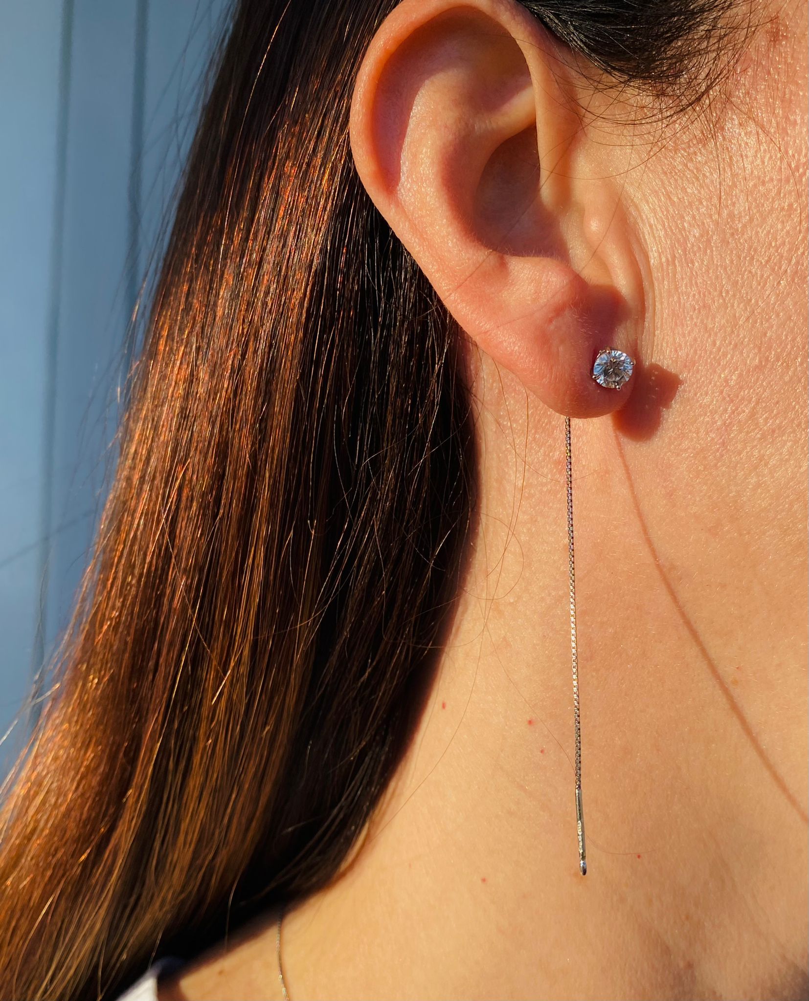 Orecchino pendente con punto luce