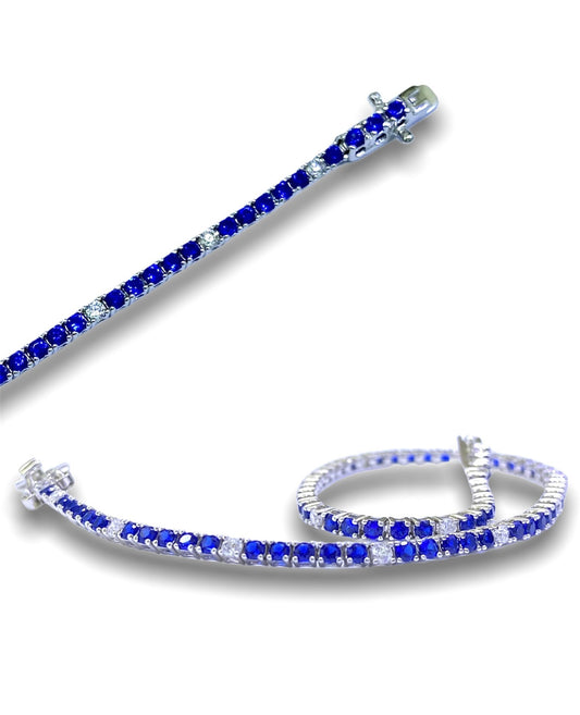 Tennis argento 925 con zirconi alternati blu e bianchi.