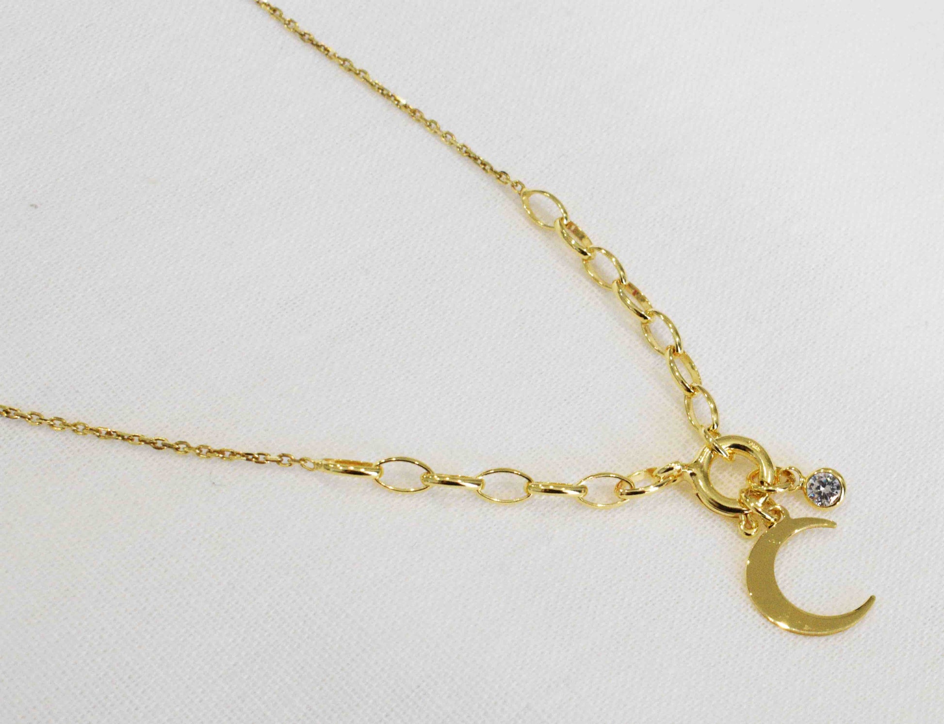 Collana Luna placcata oro con Punto luce in zirconi.