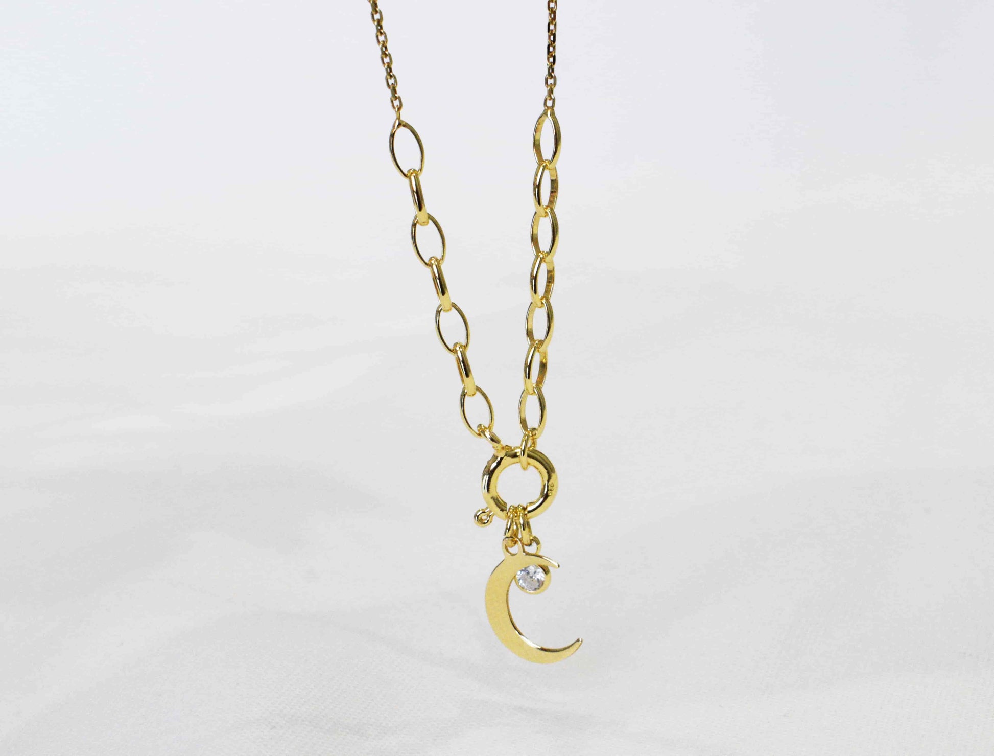 Collana Luna placcata oro con Punto luce in zirconi.