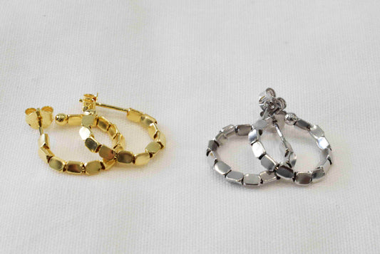Coppia orecchini movibili in argento 925 colorazioni argento e placcato oro.