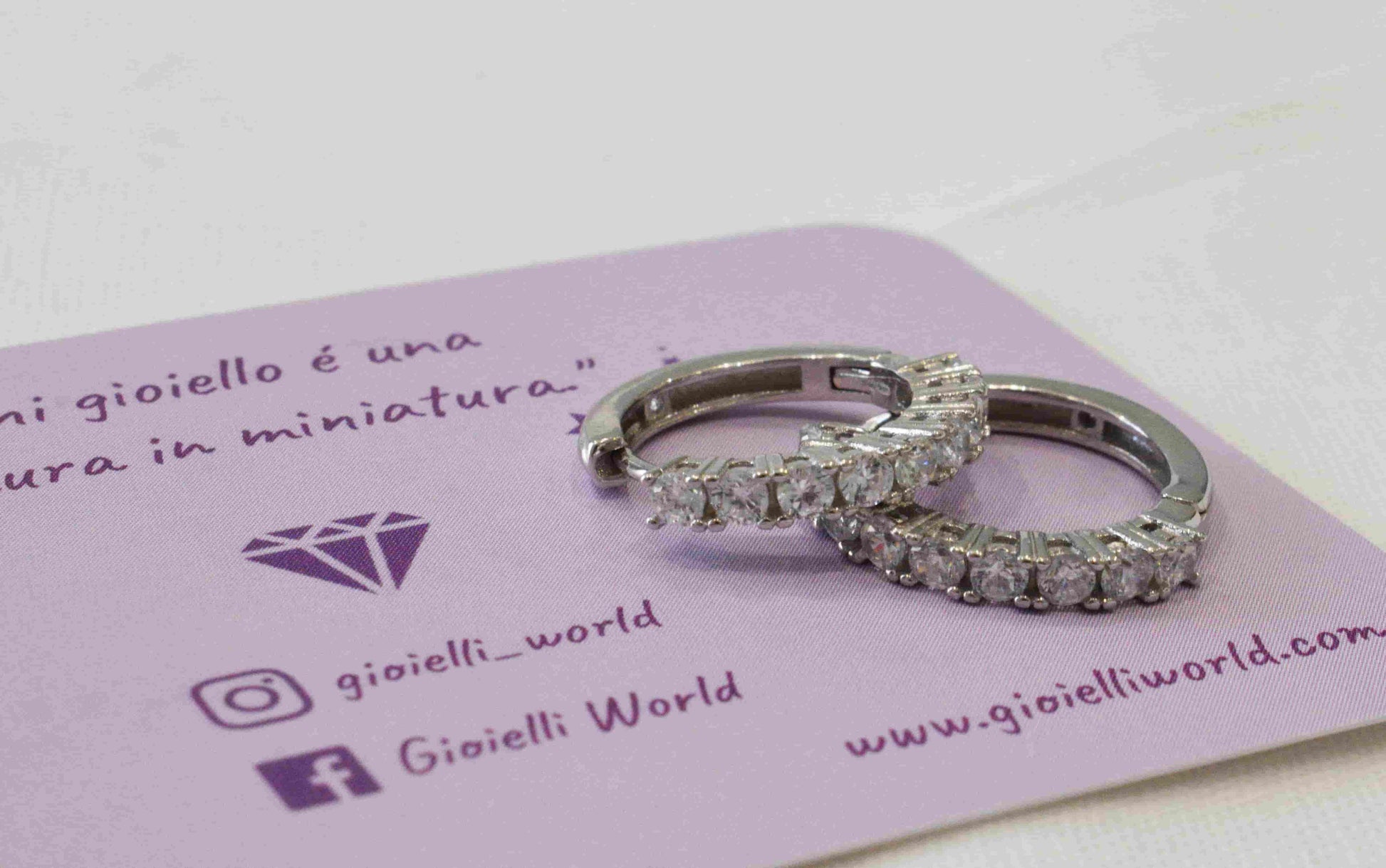 Coppia Orecchini semi zirconati in argento 925.